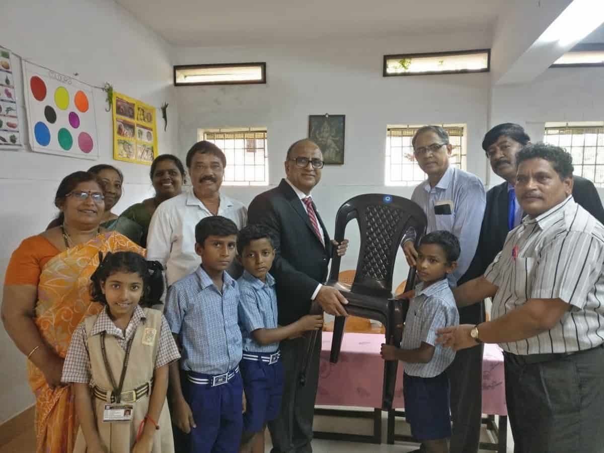 Donation of Chairs to School